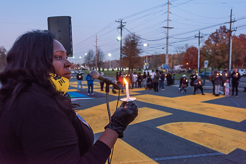 Javalda Powell leads the BLM Mural candlelight vigil