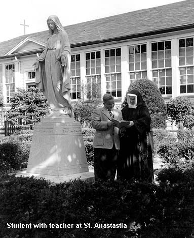 Student with teacher at St. Anastastia