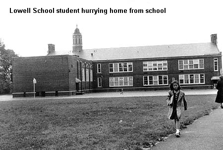 Lowell school student hurrying home from school